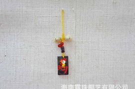 海南特色工藝品的商機 廠家直銷生肖手機掛件與椰雕掛飾全解析
